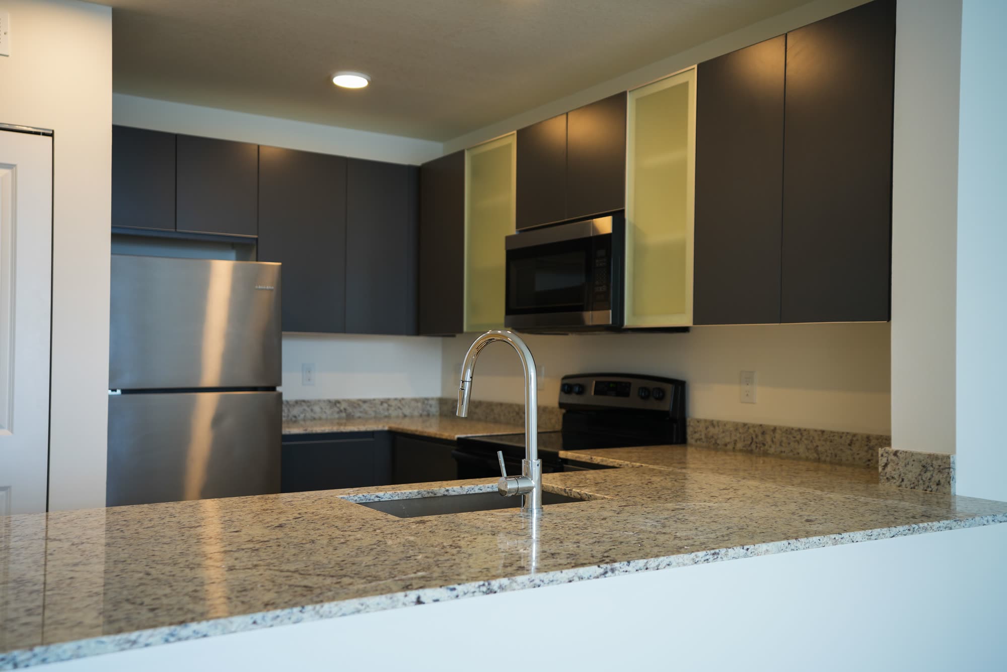 Granite countertop seam and edge detail showing professional installation work with precision joining of granite slabs and polished seam finish